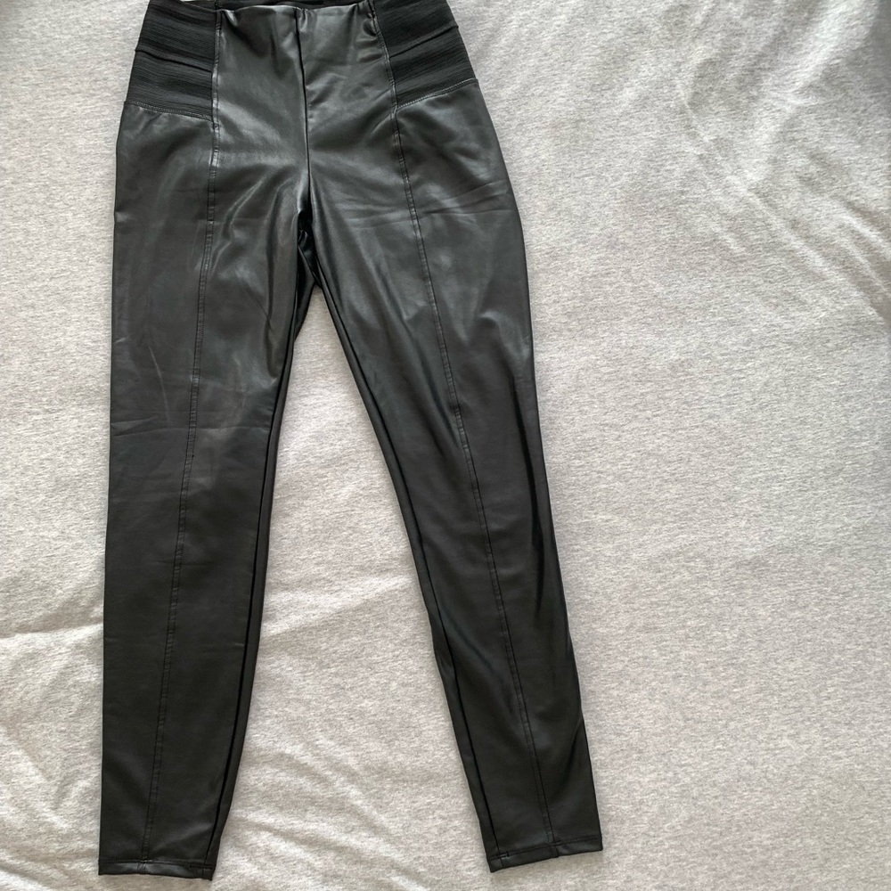 Black Dynamite pleather leggings. With elastic waist band.